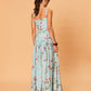 Back view of Diana Maxi Dress from La Maise Studio showing wide straps, fitted waist and flowing floral maxi skirt.